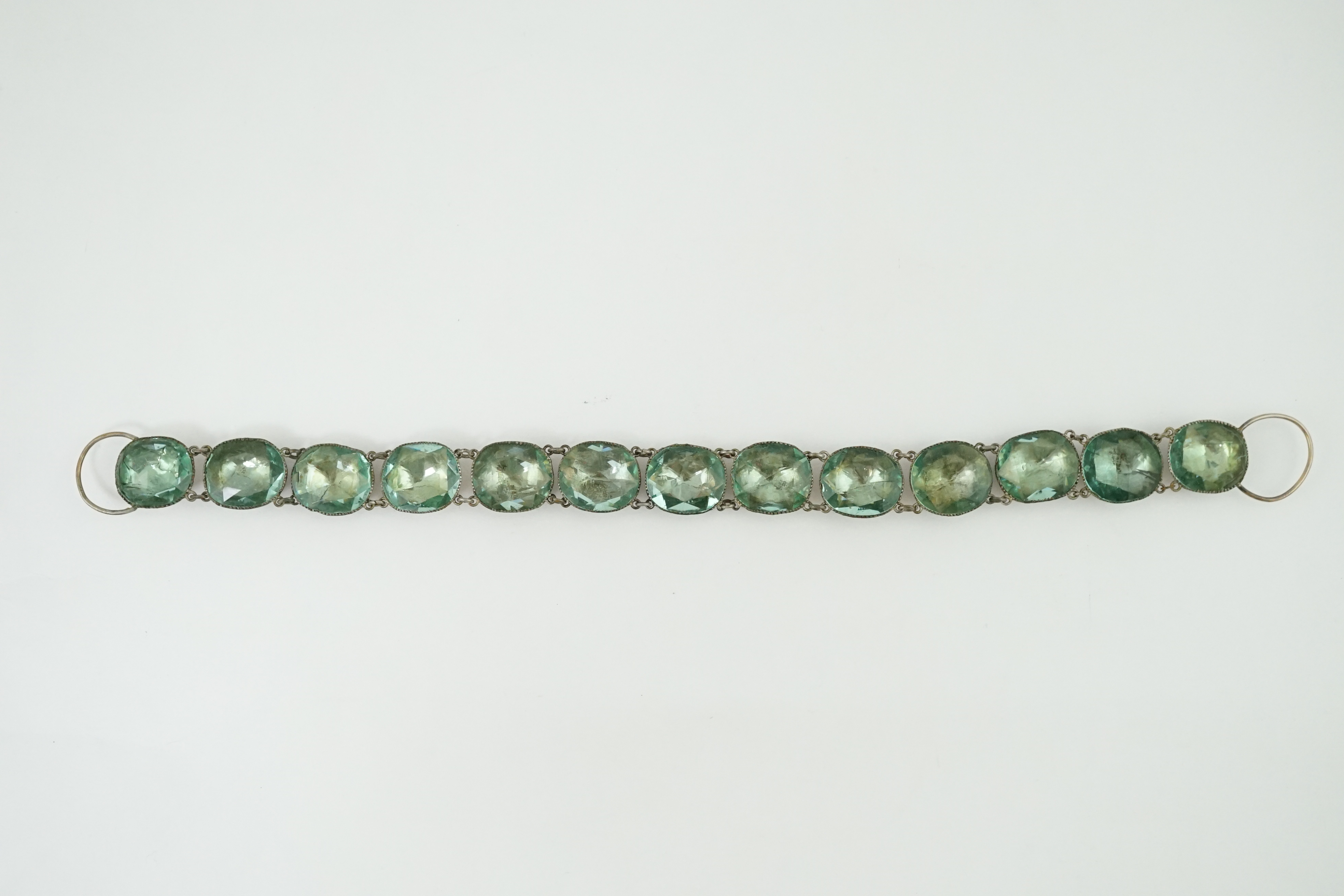 A rare 18th century 'Queen Anne' silvered metal and foil backed aquamarine paste necklace